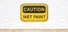 CAUTION WET PAINT