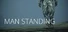 MAN STANDING